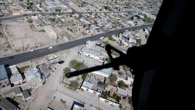 Guns over Jaurez.jpg